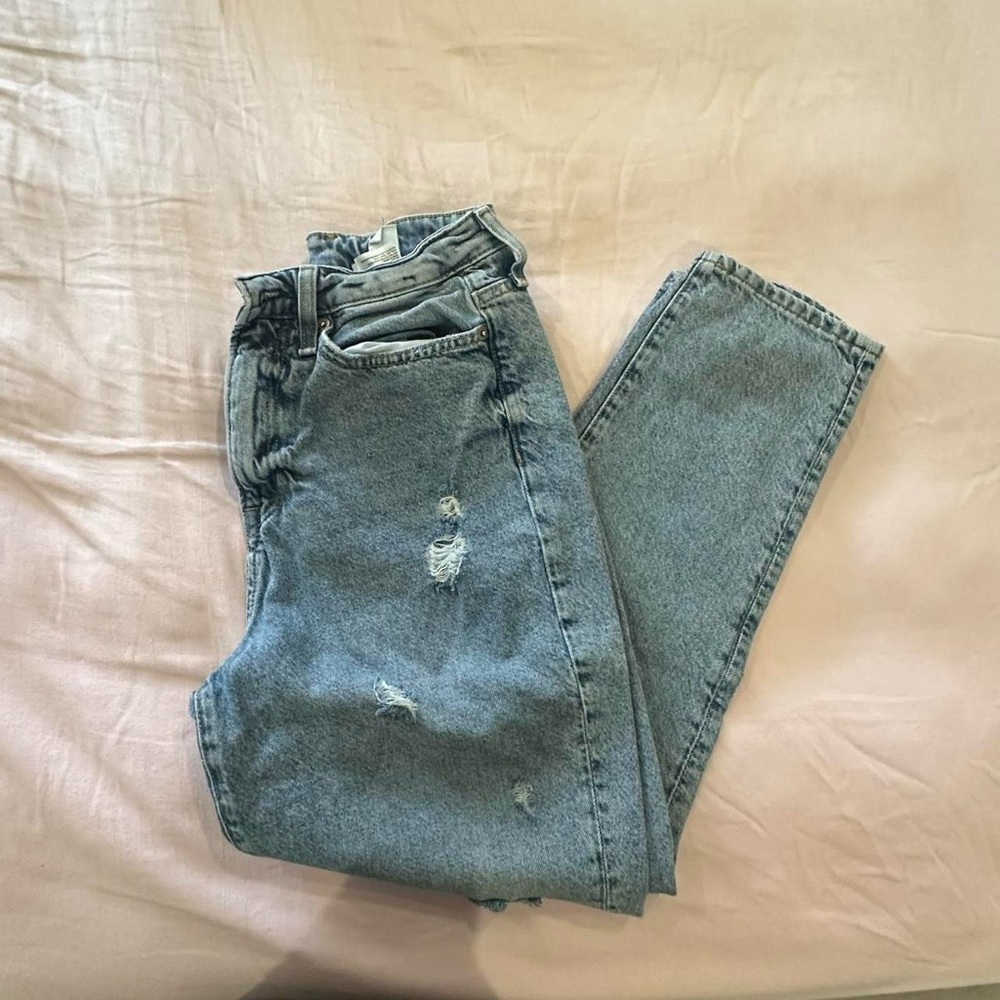 Distressed light wash mom jeans